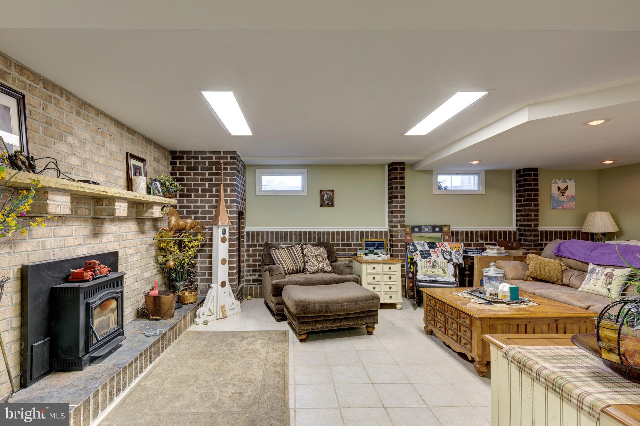 2226 Harney Road Littlestown, PA 17340 - Photo 129 of 131 a living room with furniture and a fireplace