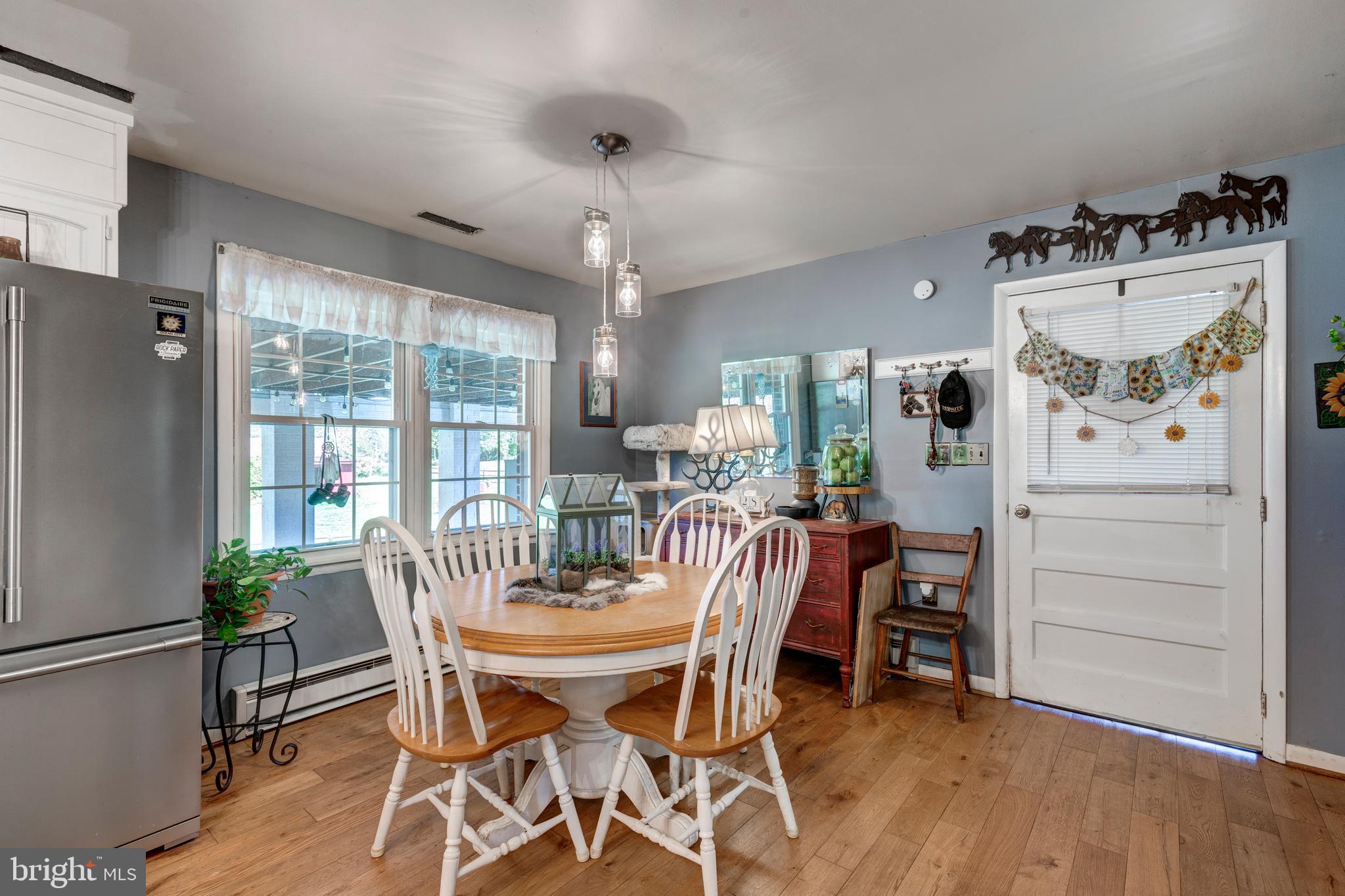 2226 Harney Road Littlestown, PA 17340 - Photo 28 of 131 a view of a dining room with furniture window and outside view