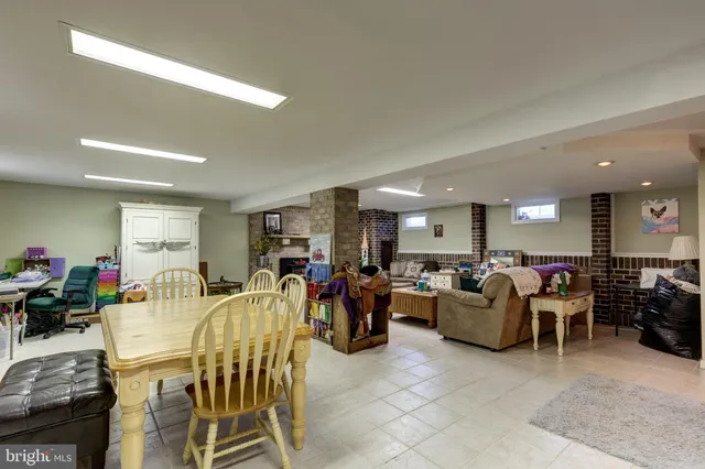 an aerial view of a residential houses with outdoor space
