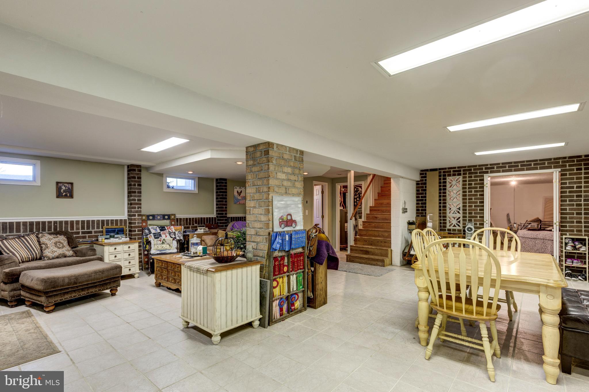 2226 Harney Road Littlestown, PA 17340 - Photo 38 of 131 a living room with furniture and a large window
