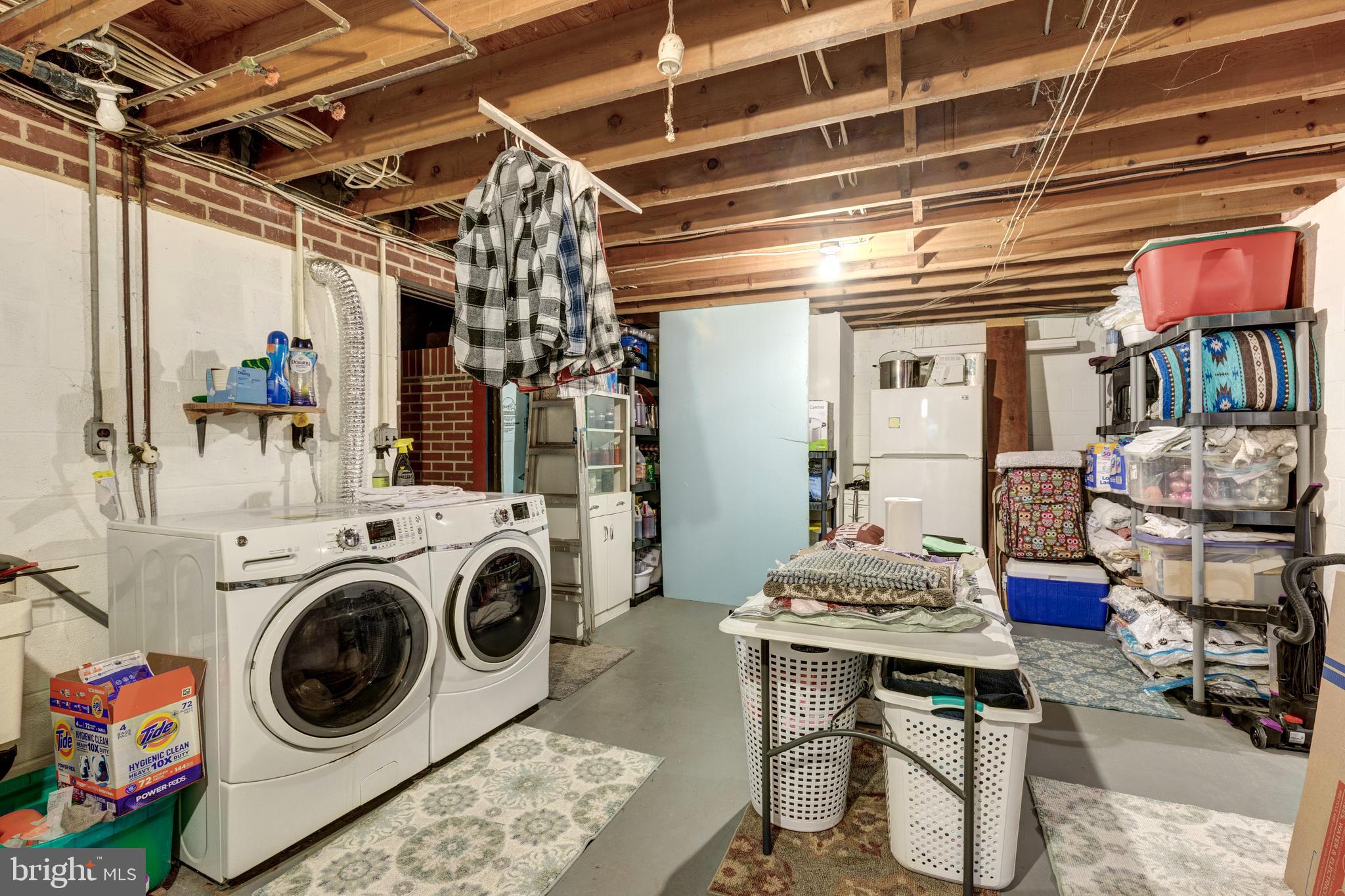2226 Harney Road Littlestown, PA 17340 - Photo 45 of 131 a utility room with sink dryer and washer