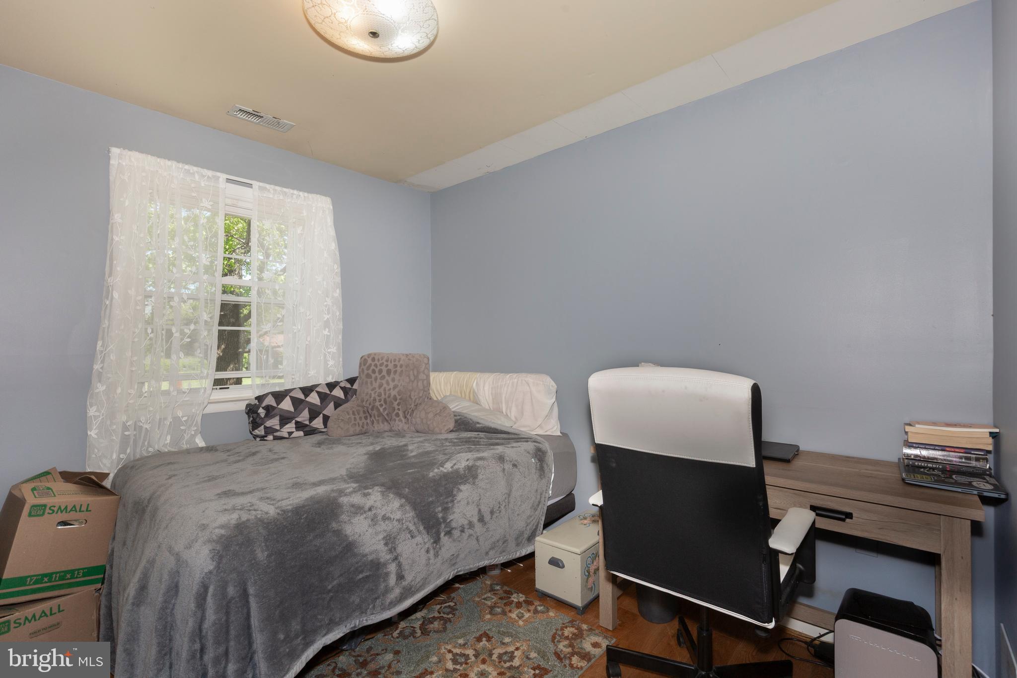 2226 Harney Road Littlestown, PA 17340 - Photo 60 of 131 a bedroom with a bed chair and a desk