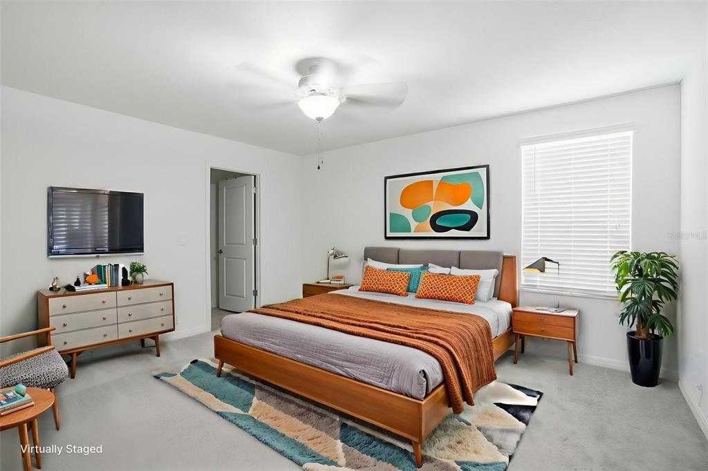 13712 Newbridge Street Spring Hill, FL 34609 - Photo 15 of 35 a bedroom with bed and window