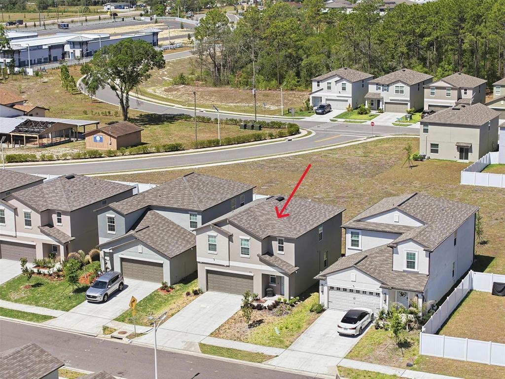 13712 Newbridge Street Spring Hill, FL 34609 - Photo 35 of 35 an aerial view of residential houses with outdoor space