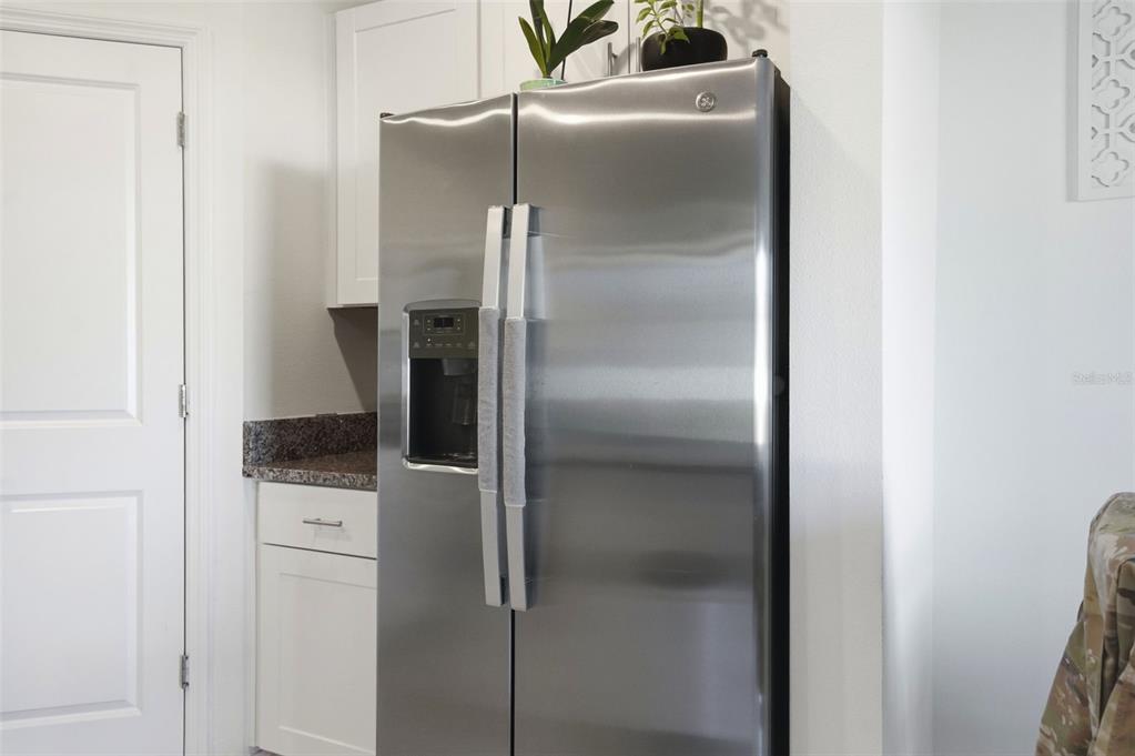13712 Newbridge Street Spring Hill, FL 34609 - Photo 10 of 35 a close view of a refrigerator in kitchen and a refrigerator
