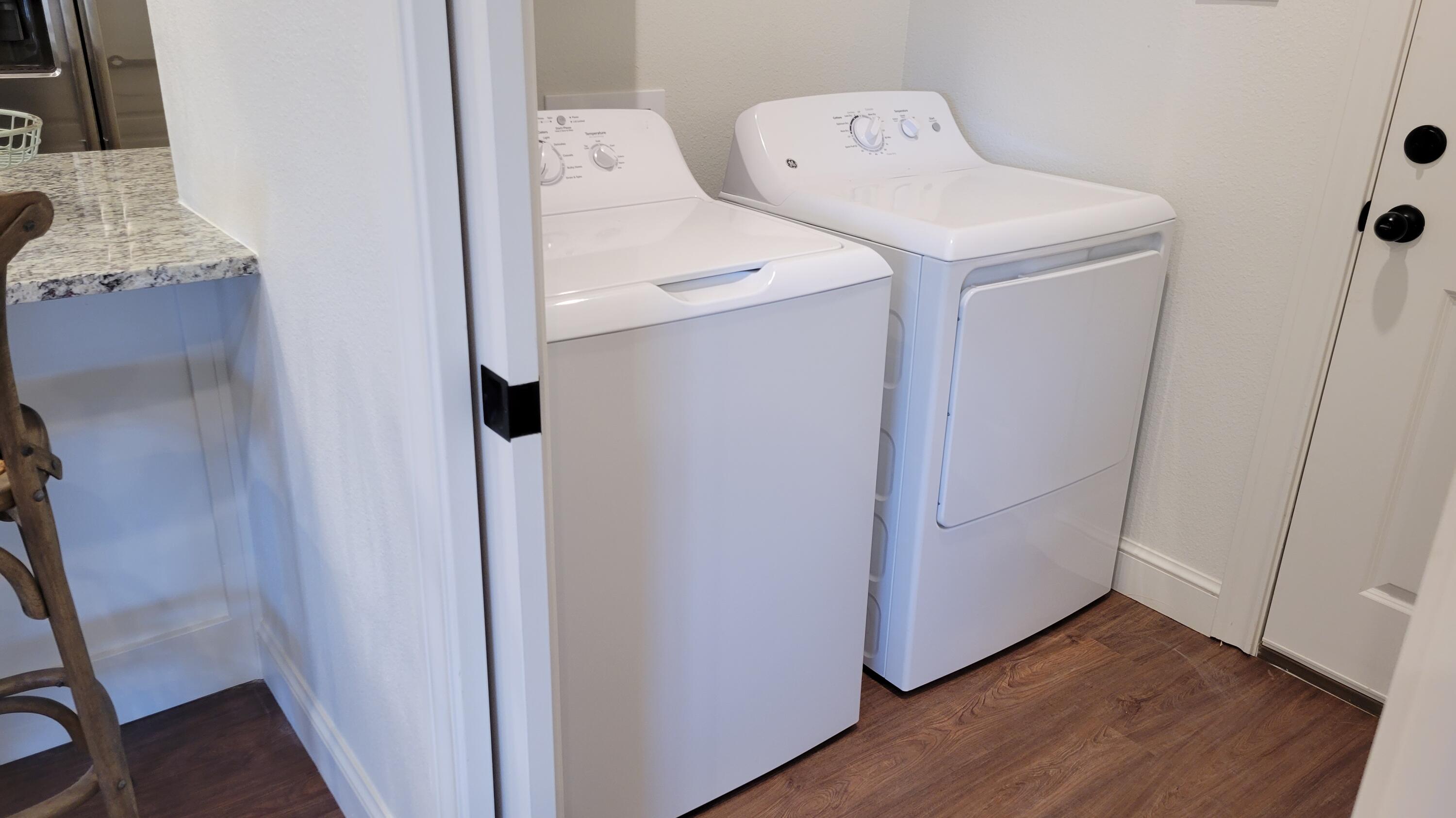 7120 22nd Street Lubbock, TX 79407 - Photo 16 of 40 a utility room with dryer and washer