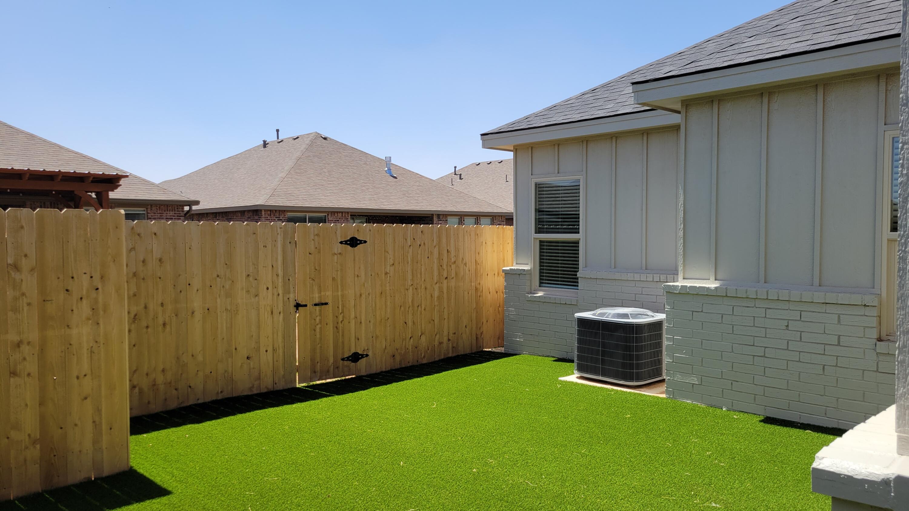 7120 22nd Street Lubbock, TX 79407 - Photo 38 of 40 a backyard of a house with seating space