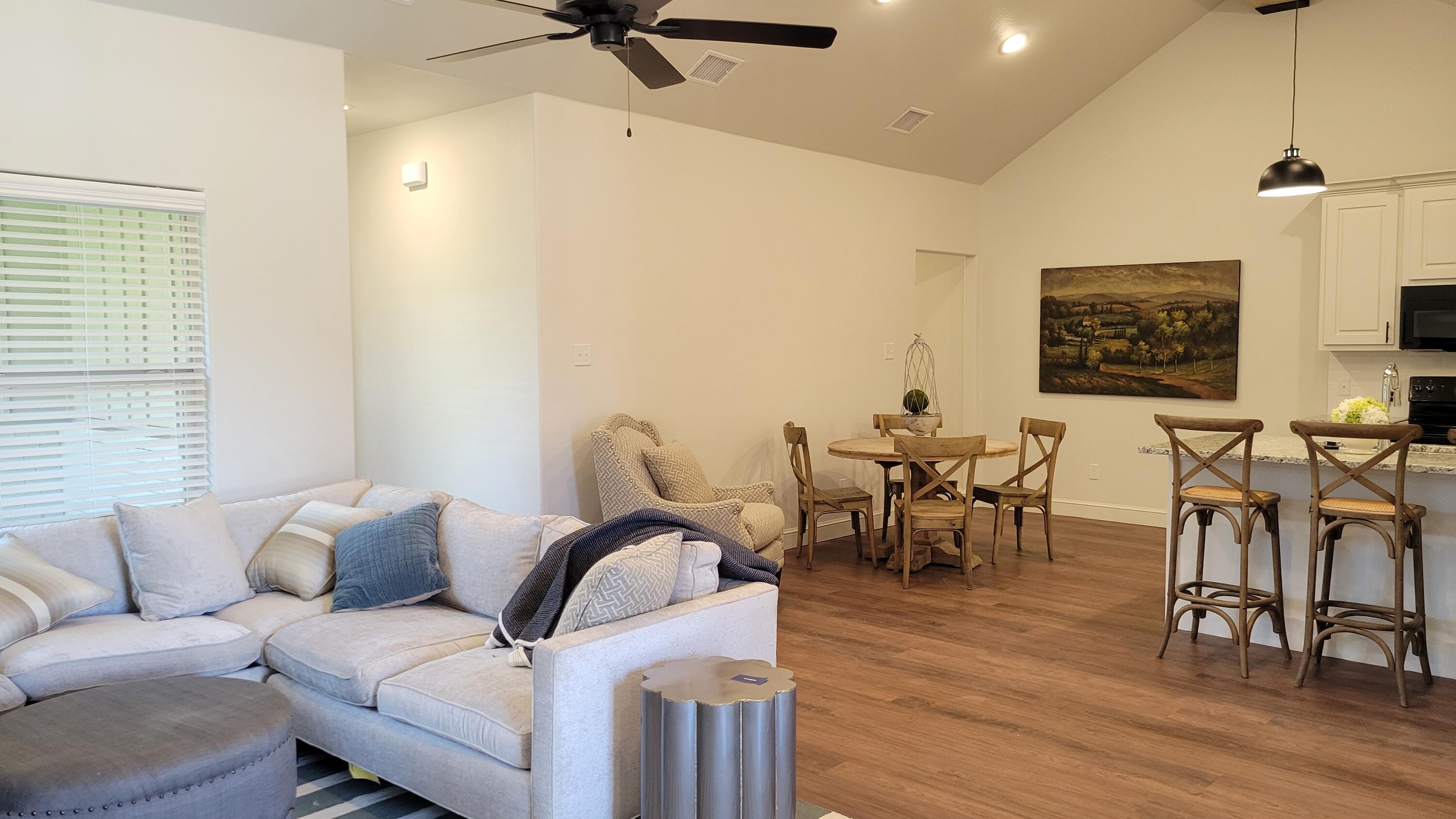 7120 22nd Street Lubbock, TX 79407 - Photo 5 of 40 a living room with furniture and a wooden floor