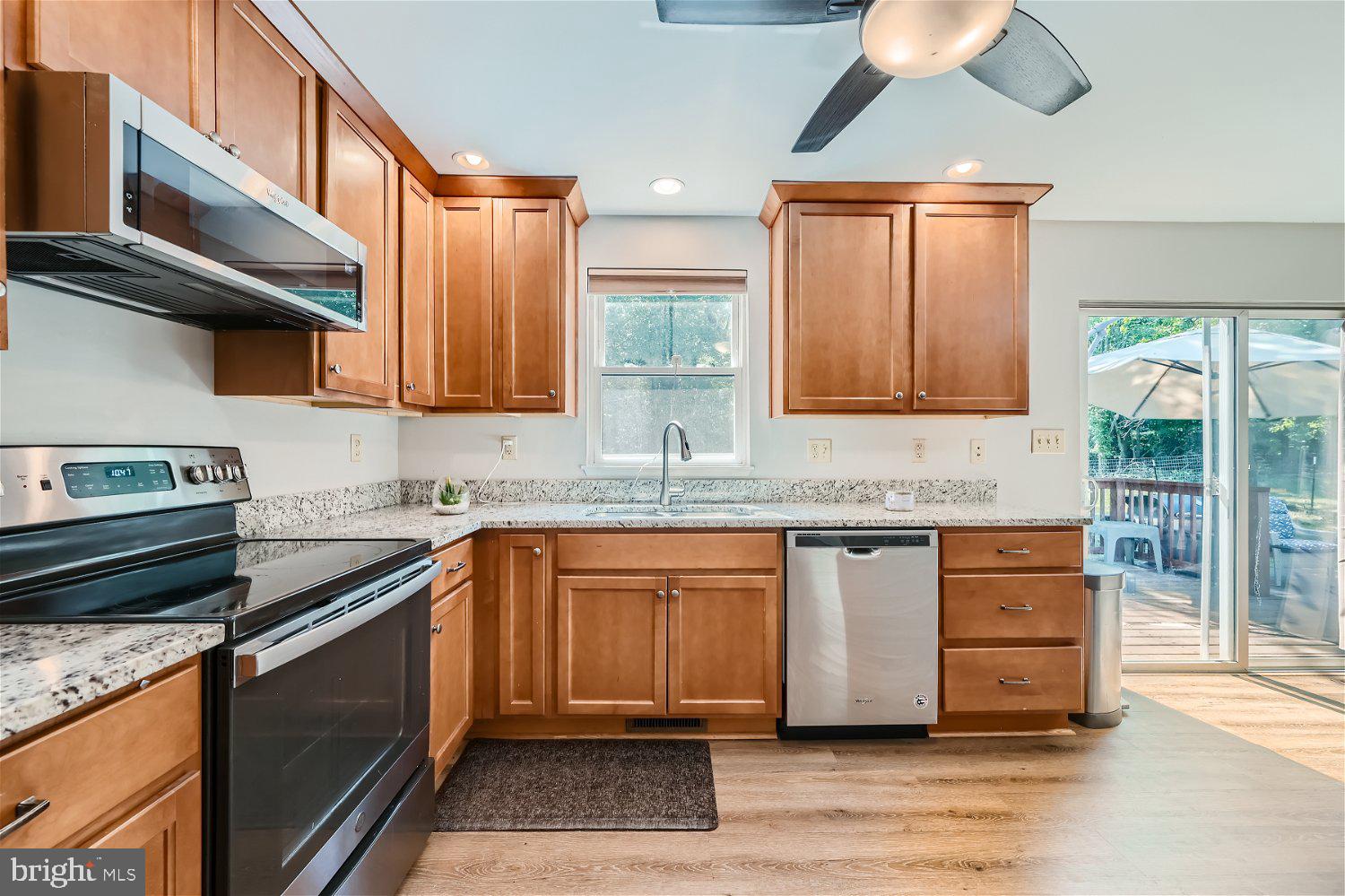 1777 Simms Lane Hanover, MD 21076 - Photo 11 of 29 Kitchen leads to back deck thru sliding doors