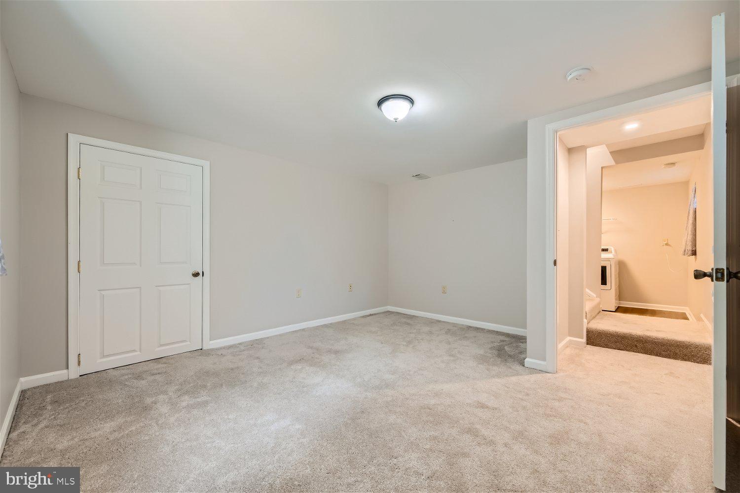 1777 Simms Lane Hanover, MD 21076 - Photo 22 of 29 Attractive Basement Room with neutral carpet