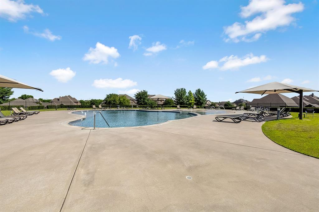 3206 Meadow Ridge Drive Midlothian, TX 76065 - Photo 36 of 37 a view of a swimming pool and lake
