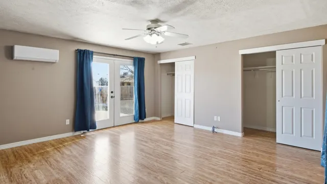 a bathroom with a bathtub a toilet and a shower