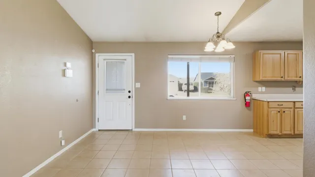 a kitchen with a refrigerator stove and microwave