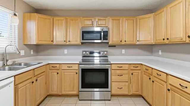 a view of hallway with wooden floor