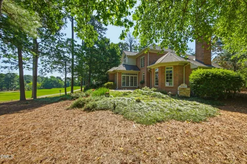 a view of a yard with a fountain