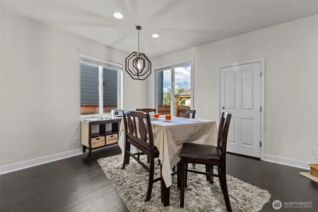 a view of a dining room with furniture