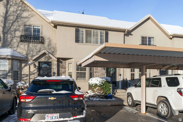 988 South 1760th Street West Springville, UT 84663 - Photo 1 of 1 View of front of home with stucco siding, stone siding, and covered parking