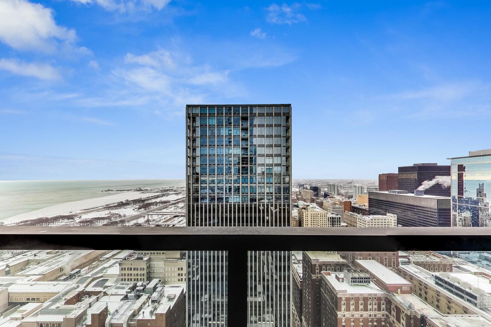 60 East Monroe Street, Unit 4404 Chicago, IL 60603 - Photo 17 of 34 a view of ocean from a balcony