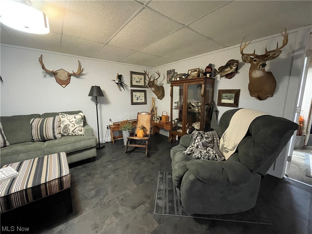 5793 Veto Road Belpre, OH 45714 - Photo 15 of 40 Living room with a drop ceiling