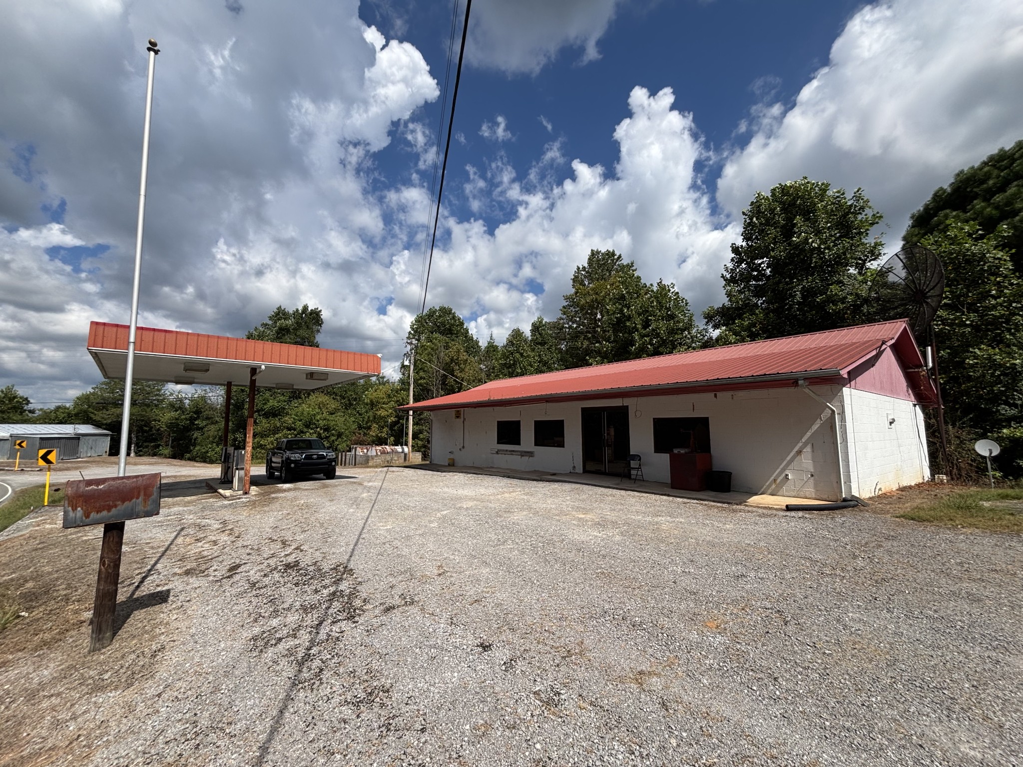 4111 Jefferson Road Smithville, TN 37166 - Photo 2 of 8 a view of a house with backyard and sitting area