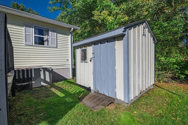 a view of a back yard of the house
