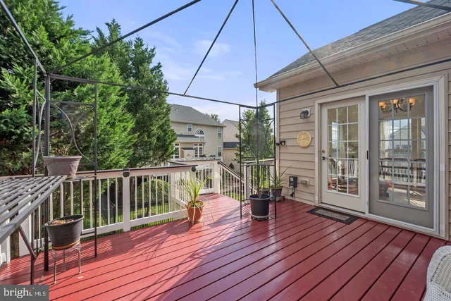 a view of a balcony with wooden floor