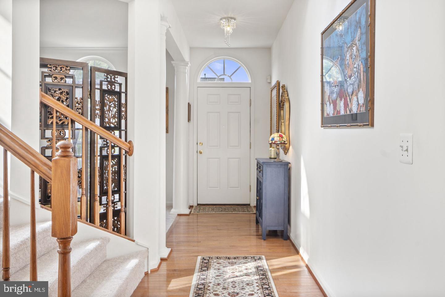 6528 Atkins Way Gainesville, VA 20155 - Photo 2 of 42 a view of an entryway with wooden floor