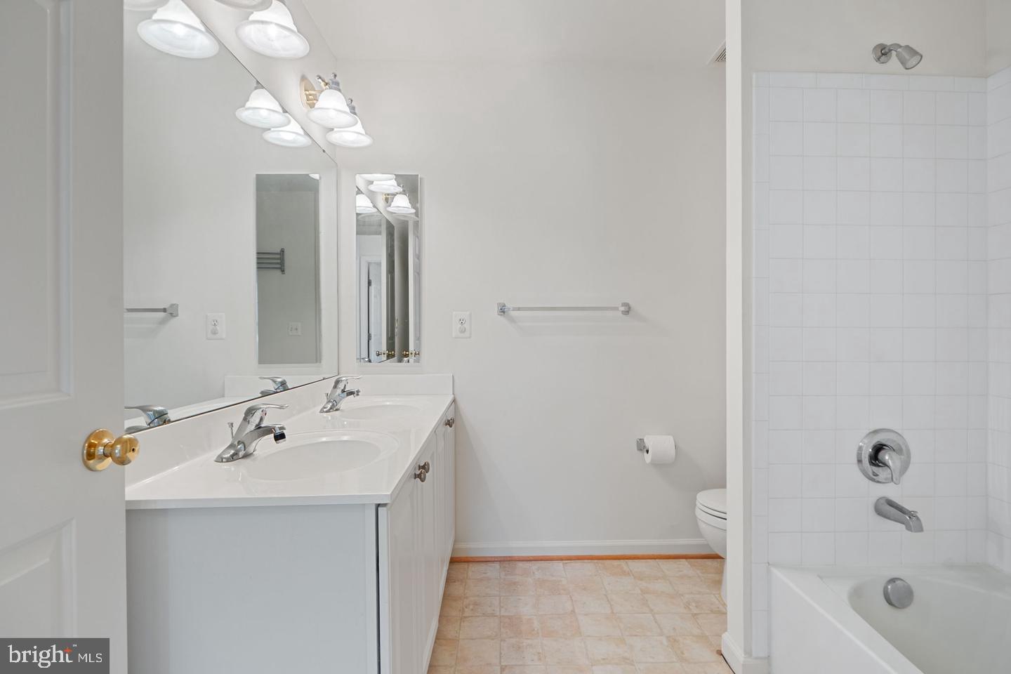 6528 Atkins Way Gainesville, VA 20155 - Photo 33 of 42 a bathroom with a sink a toilet and shower
