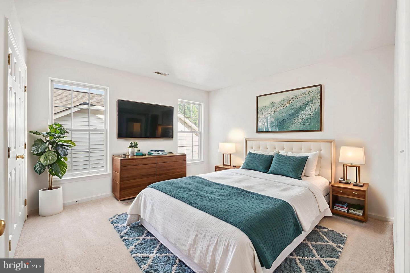 6528 Atkins Way Gainesville, VA 20155 - Photo 34 of 42 a bedroom with a bed and a television