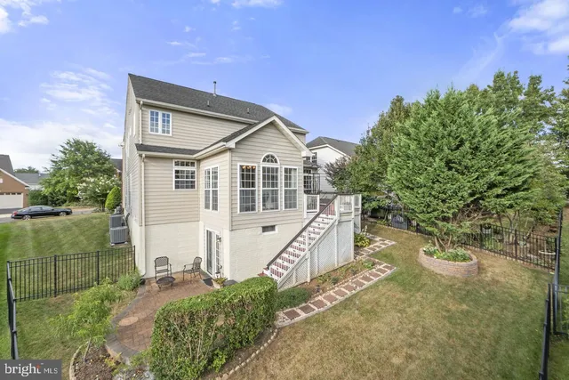 a house with trees in the background