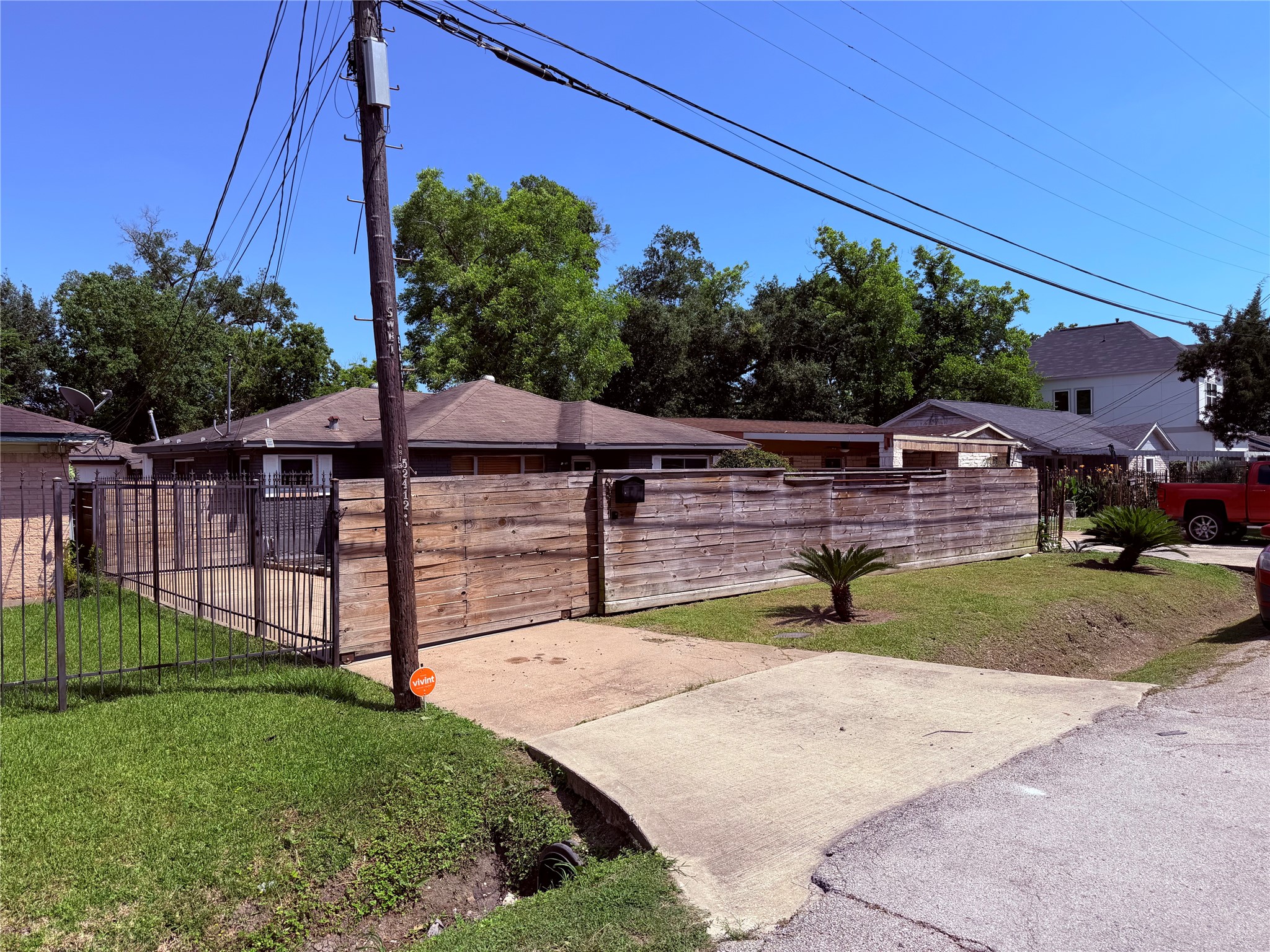 6811 St Augustine Street Houston, TX 77021 - Photo 2 of 20 a view of backyard with wooden fence
