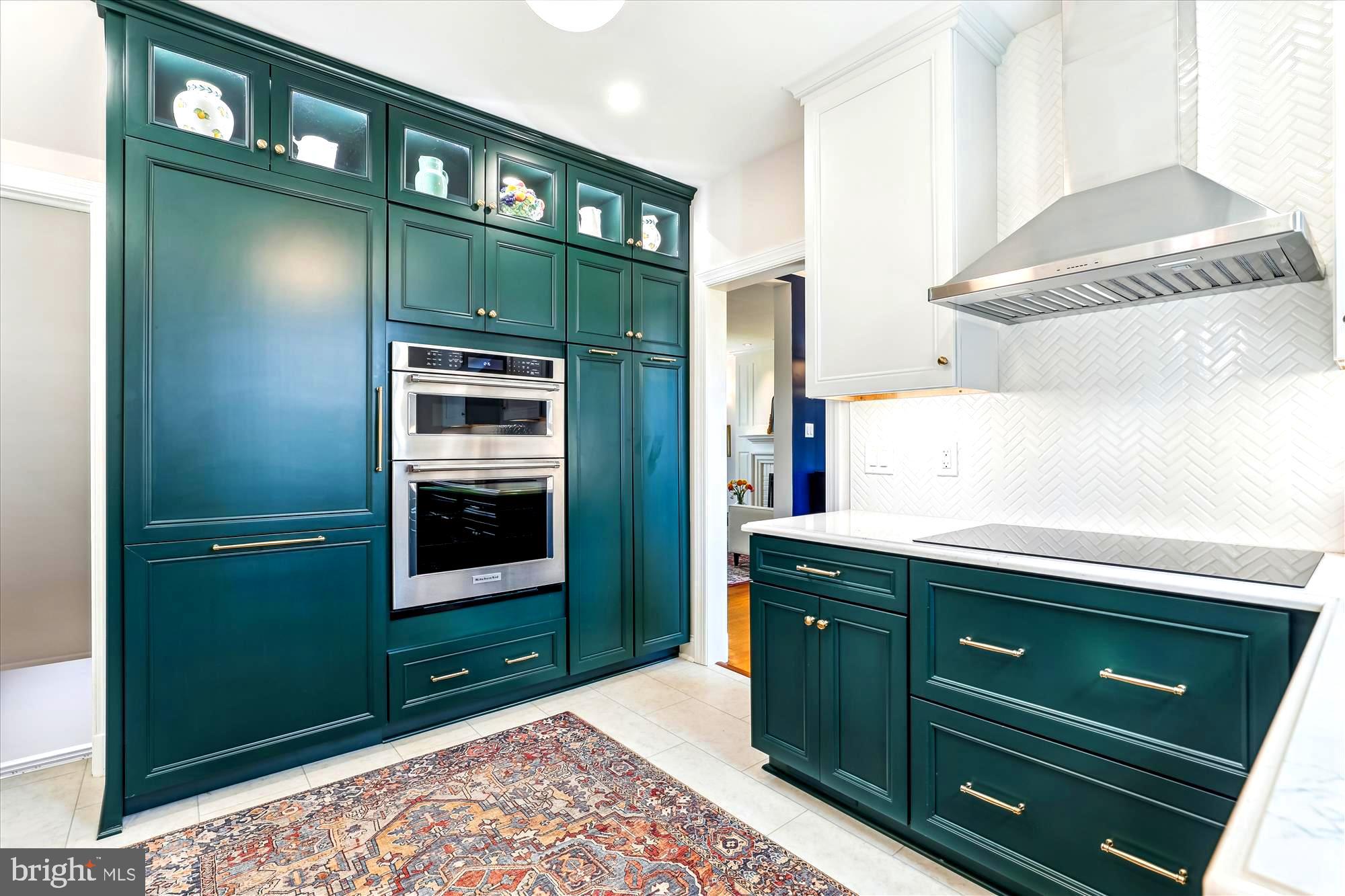 3568 Appleton Street Northwest Washington, DC 20008 - Photo 15 of 57 a kitchen with a refrigerator and a sink