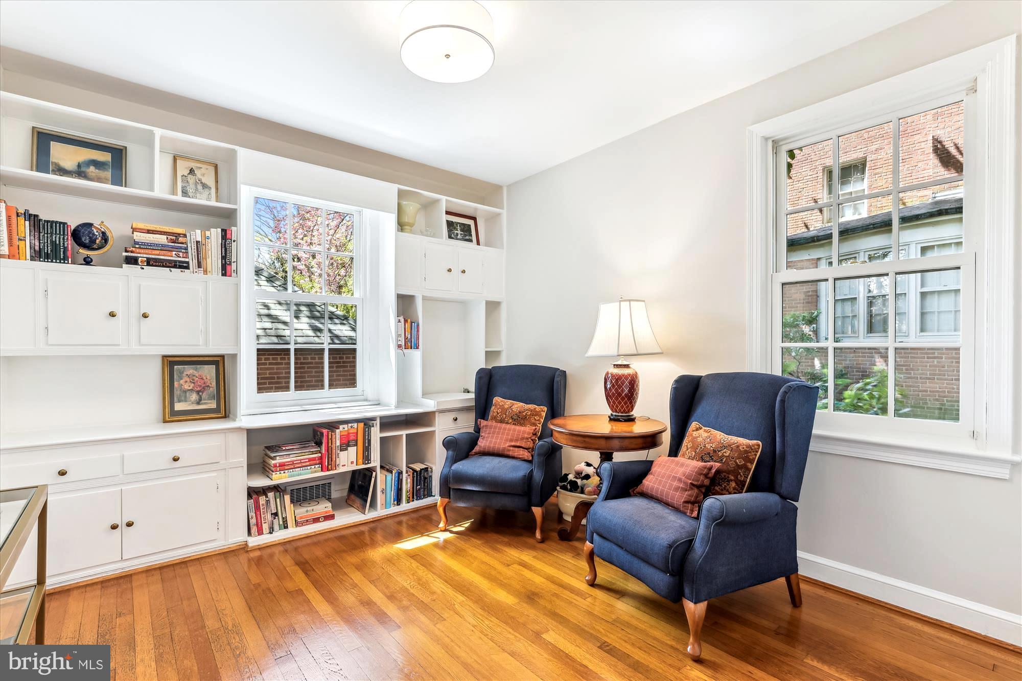 3568 Appleton Street Northwest Washington, DC 20008 - Photo 18 of 57 a living room with furniture and a book shelf