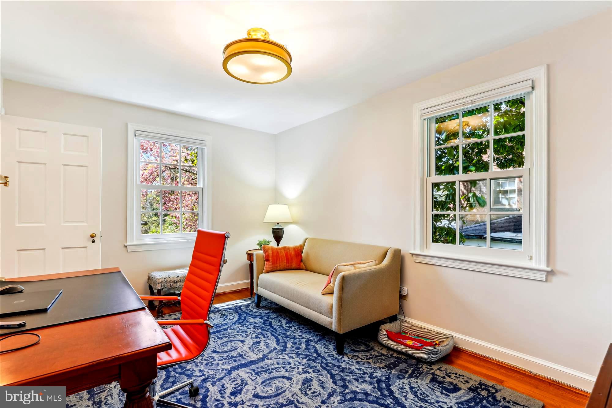 3568 Appleton Street Northwest Washington, DC 20008 - Photo 33 of 57 a living room with furniture and a window