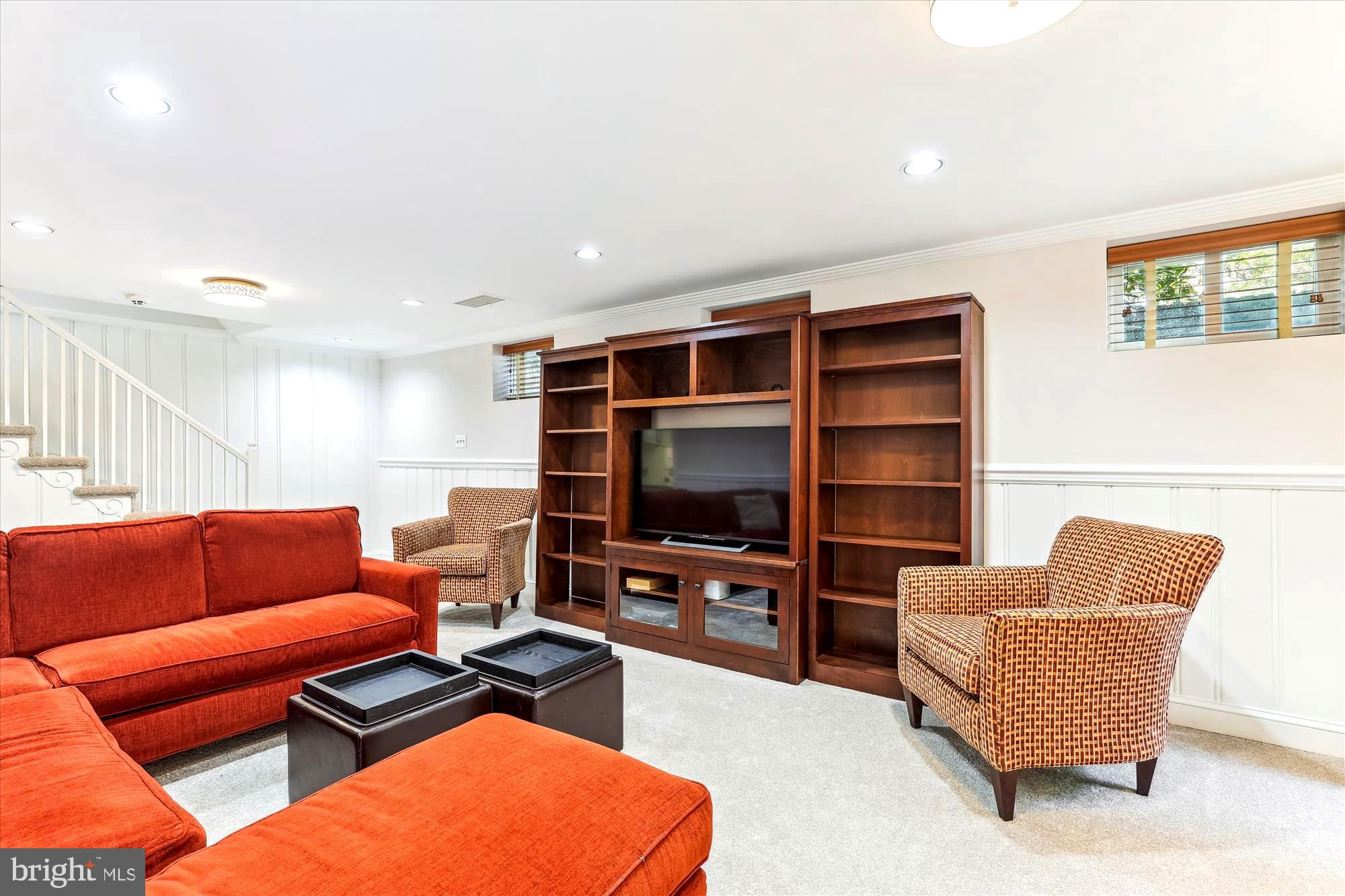 3568 Appleton Street Northwest Washington, DC 20008 - Photo 43 of 57 a living room with furniture and a flat screen tv