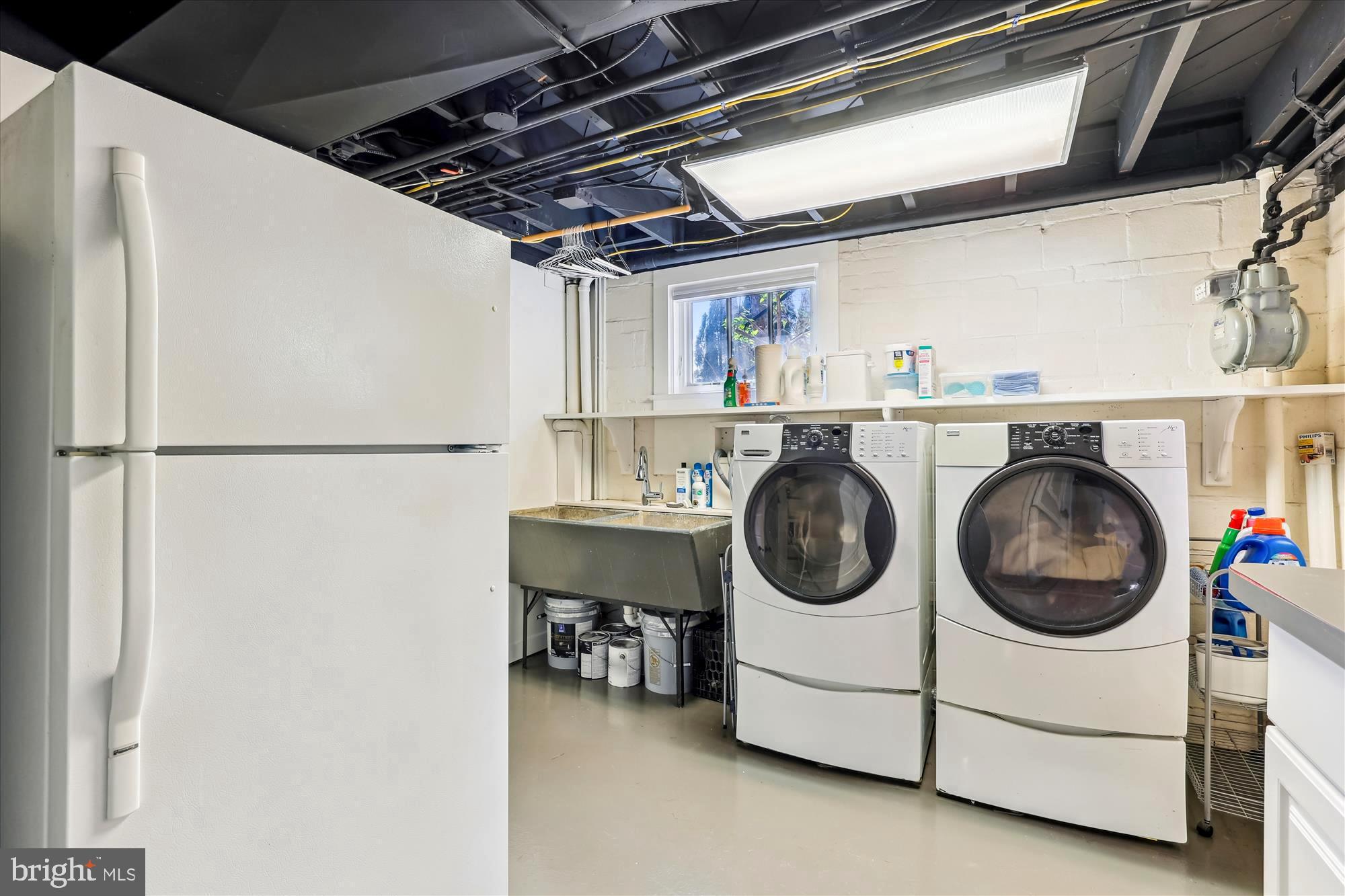 3568 Appleton Street Northwest Washington, DC 20008 - Photo 47 of 57 a utility room with dryer and washer