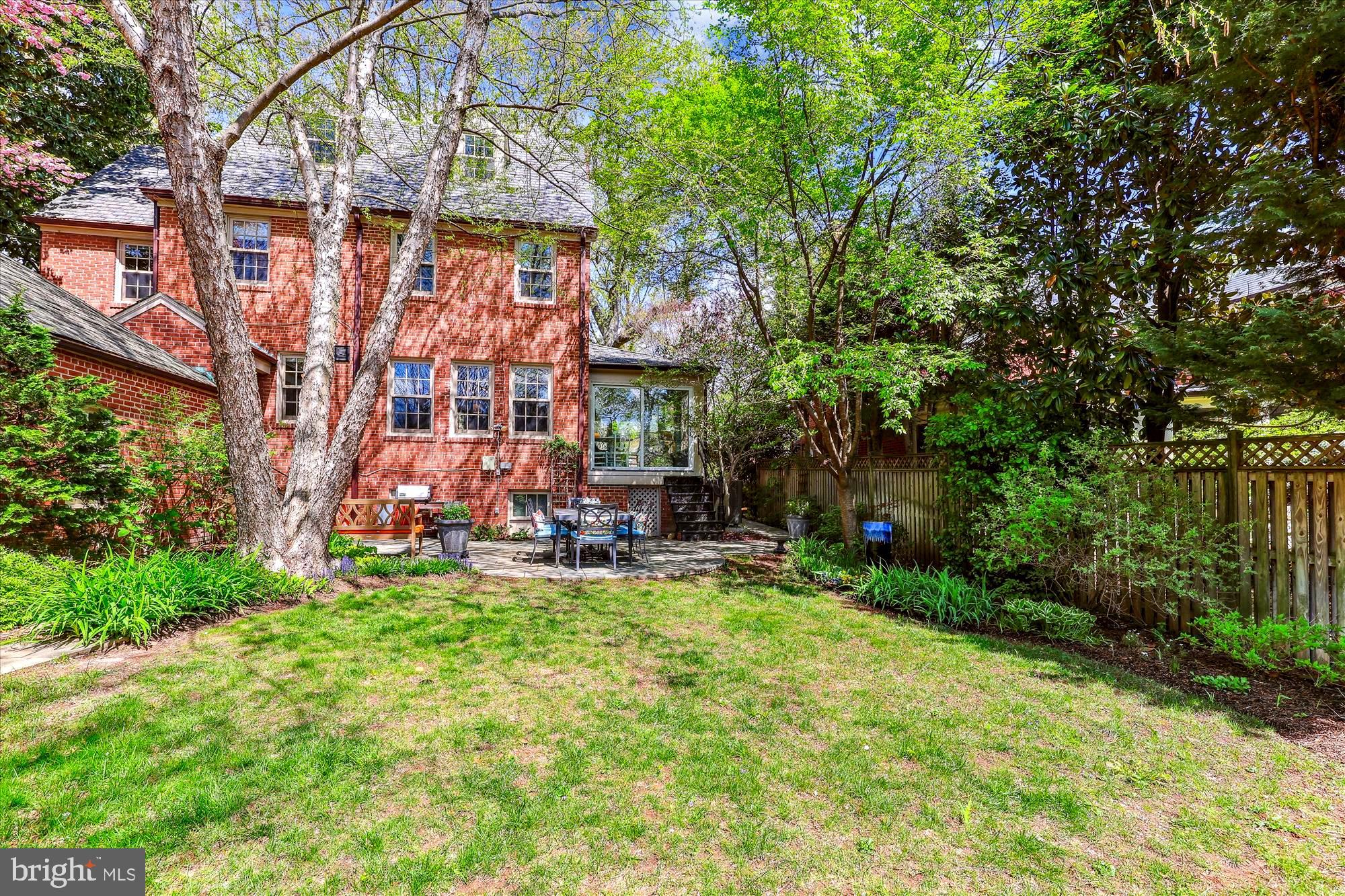 3568 Appleton Street Northwest Washington, DC 20008 - Photo 54 of 57 a view of a building with a yard and sitting area