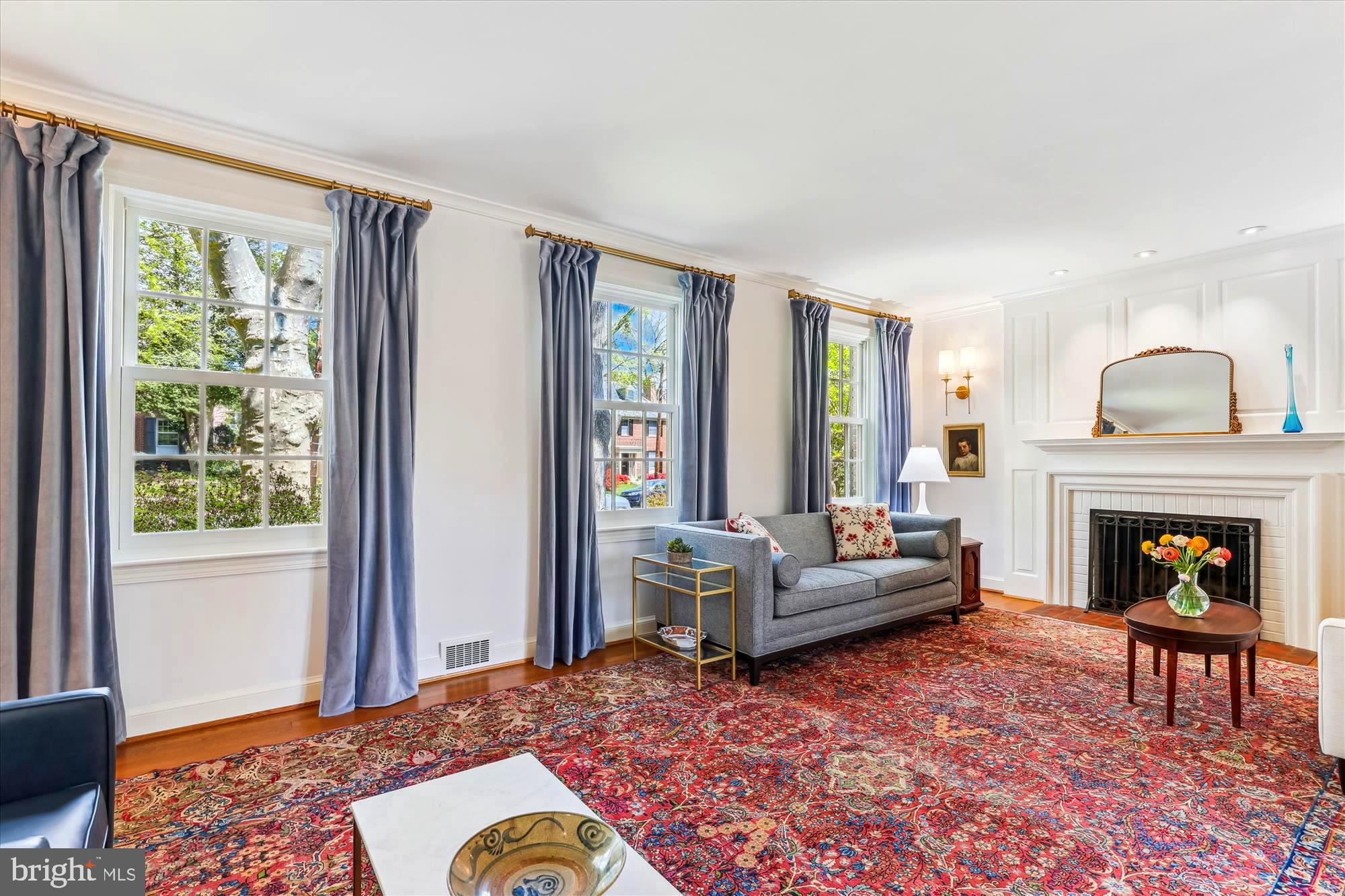 3568 Appleton Street Northwest Washington, DC 20008 - Photo 9 of 57 a living room with furniture and a fireplace