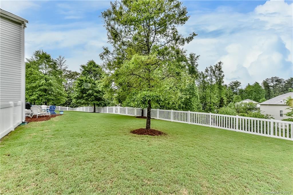 252 Sycamore Creek Road Fort Mill, SC 29708 - Photo 22 of 24 a swimming pool with wooden fence