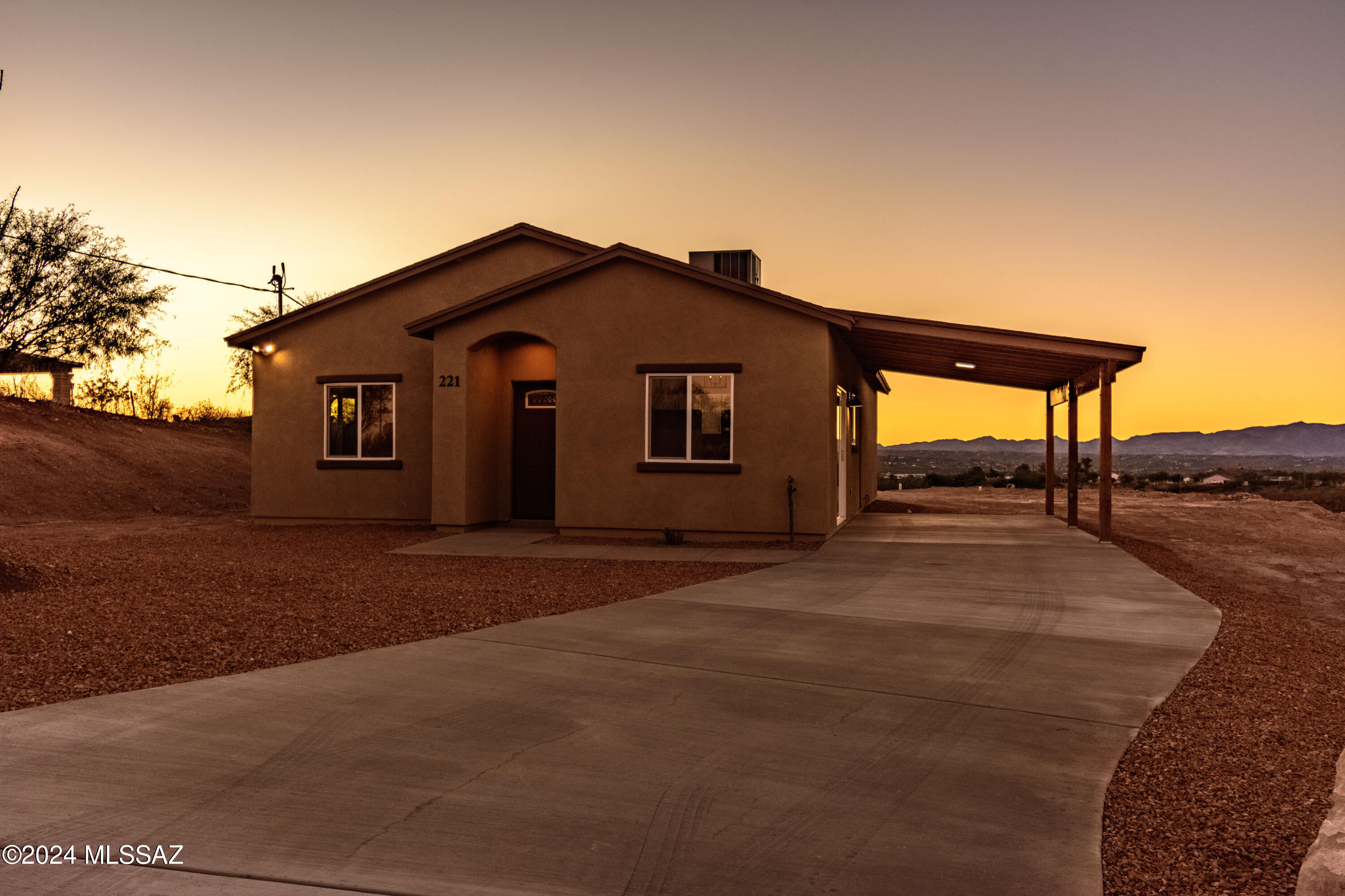221 Paseo Mascota Rio Rico, AZ 85648 - Photo 39 of 45 a view of a house with a yard