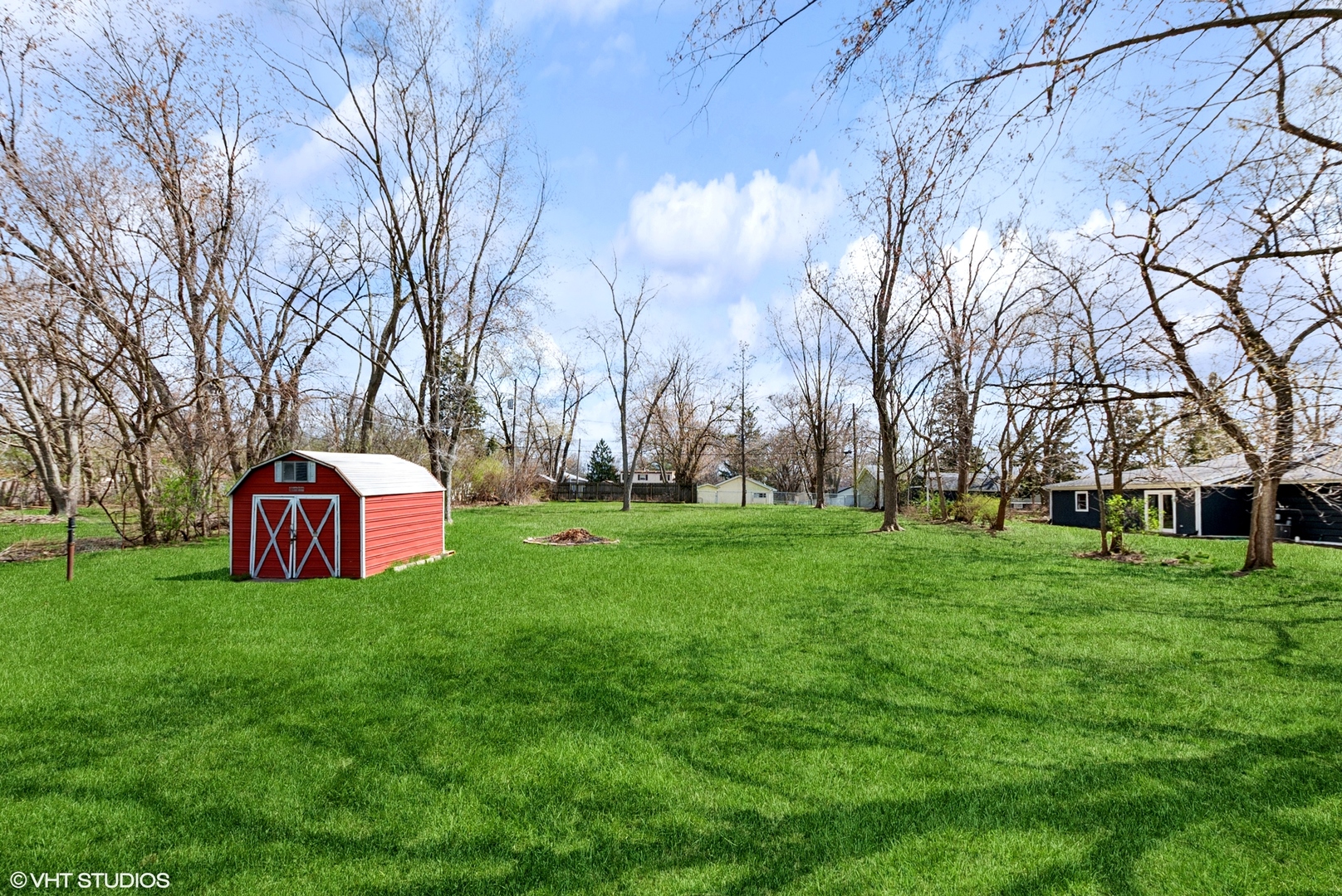 828 South Cedar Road New Lenox, IL 60451 - Photo 17 of 20 a view of a house with a big yard and large trees