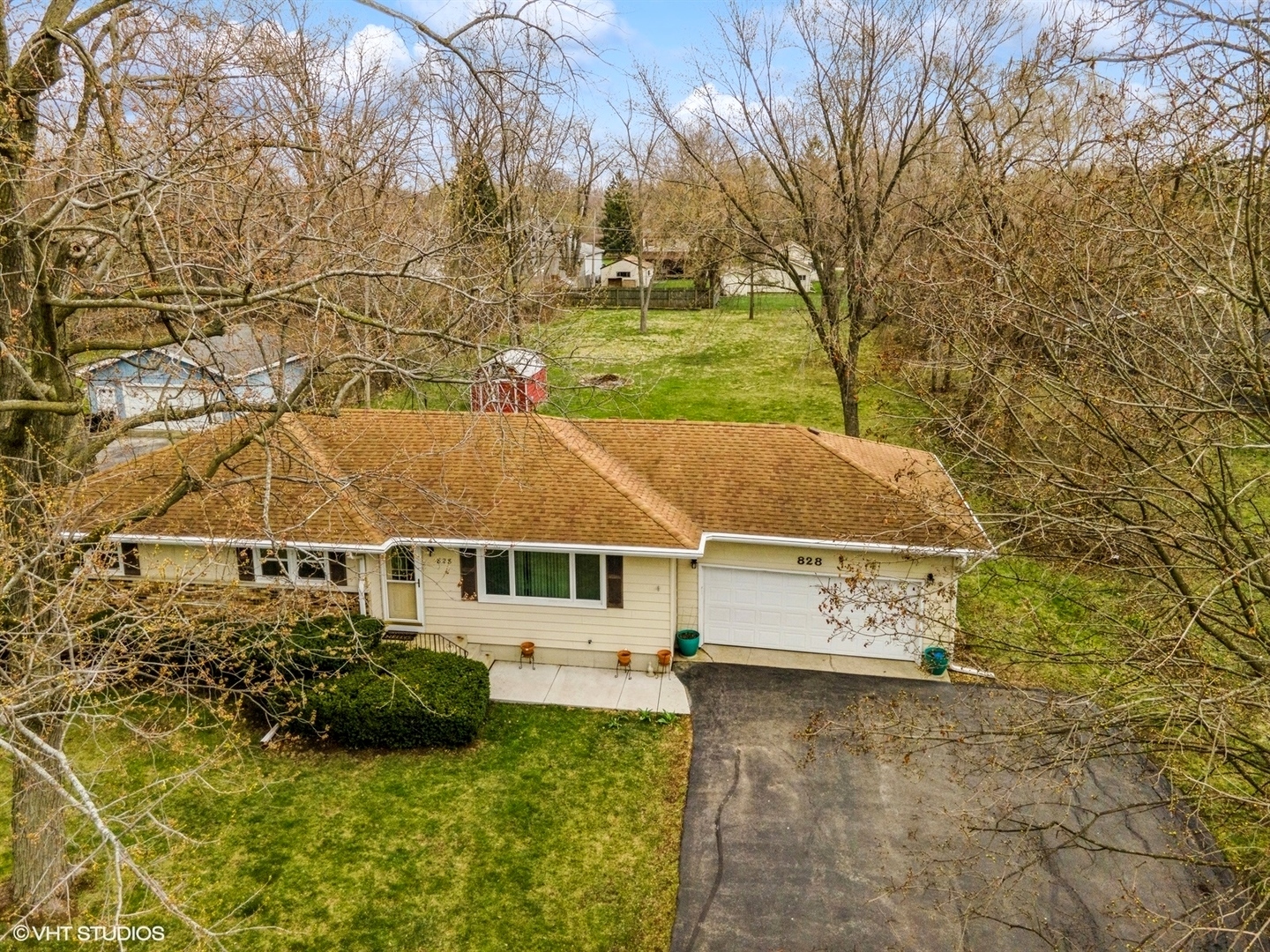 828 South Cedar Road New Lenox, IL 60451 - Photo 18 of 20 a view of a house with a yard