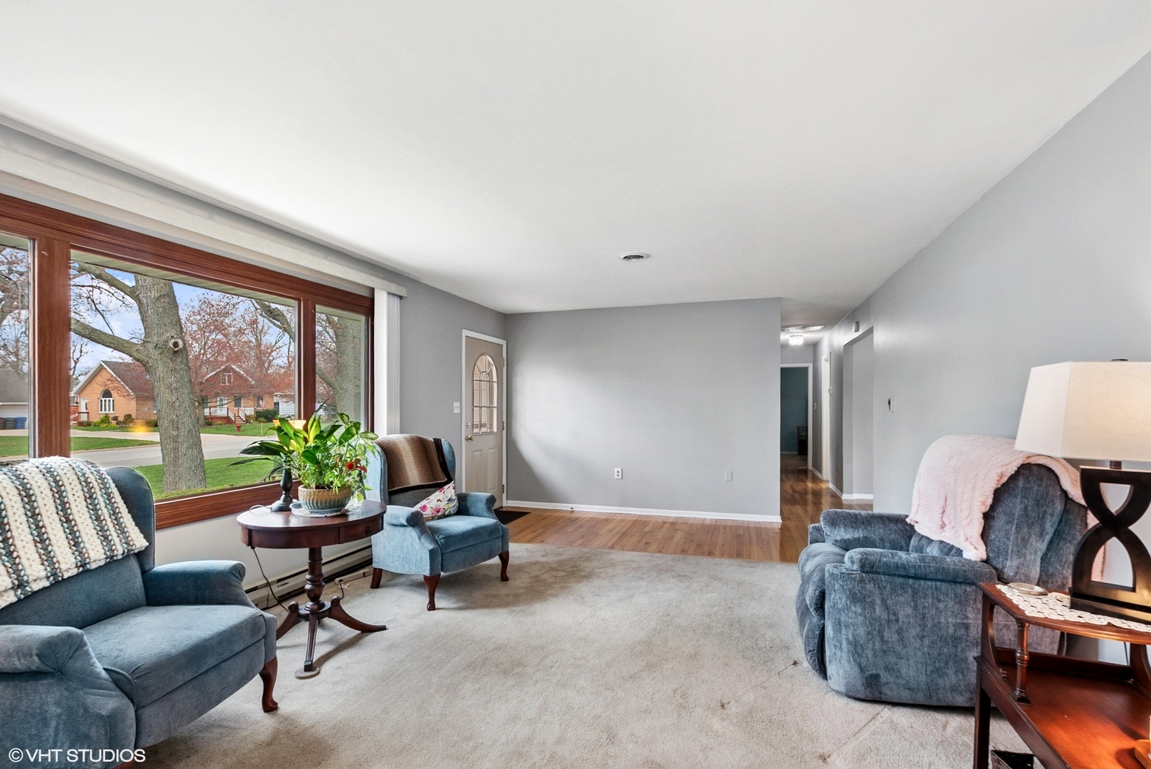 828 South Cedar Road New Lenox, IL 60451 - Photo 4 of 20 a living room with furniture and a large window