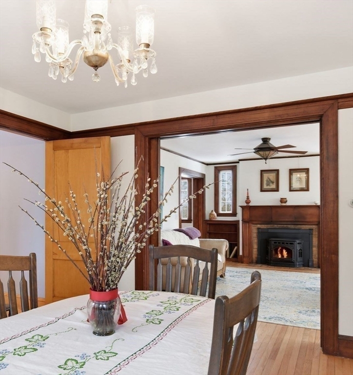 50 Mount Pleasant Amherst, MA 01002 - Photo 12 of 42 a living room with furniture a fireplace and a flat screen tv