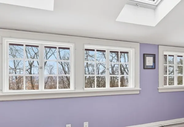 a view of a room that has a large window