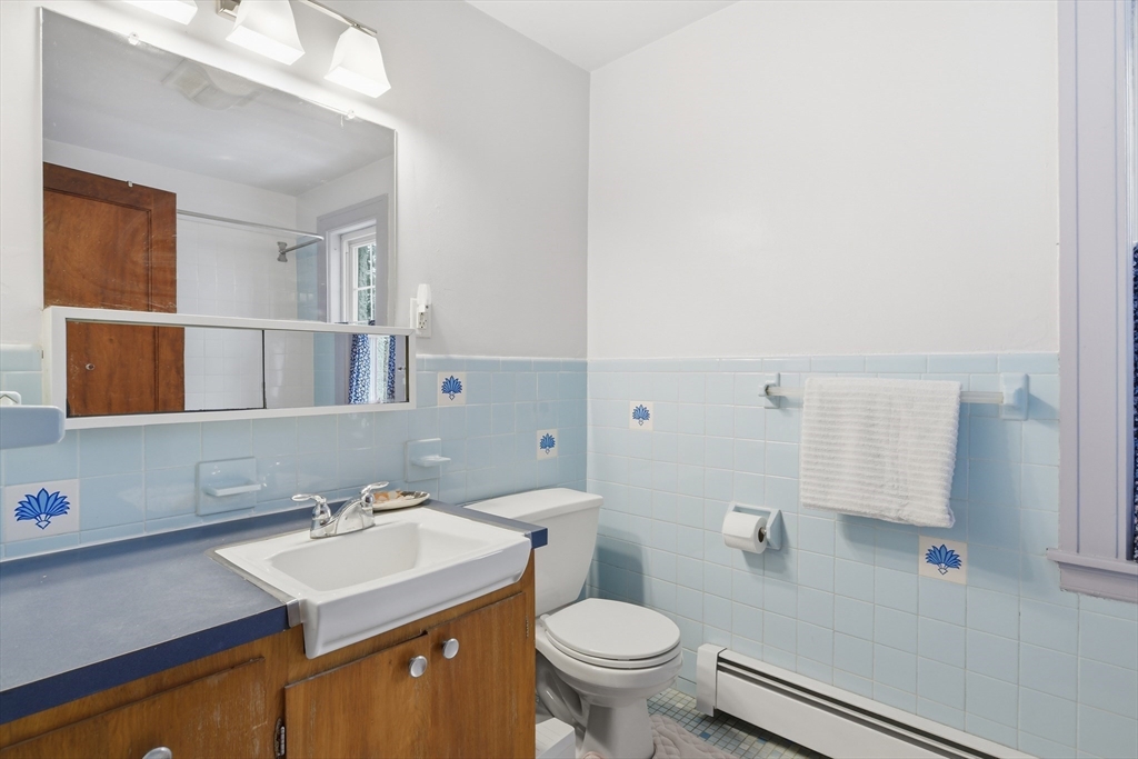 50 Mount Pleasant Amherst, MA 01002 - Photo 29 of 42 a bathroom with a sink toilet and mirror