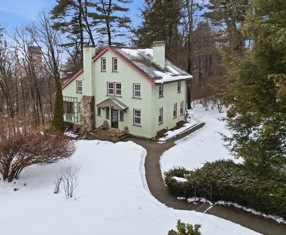 50 Mount Pleasant Amherst, MA 01002 - Photo 3 of 42 a view of a house with a yard covered in snow