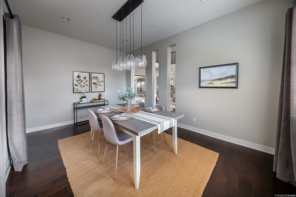 7060 Sitio Caliente Carlsbad, CA 92009 - Photo 11 of 39 a view of a dining room with furniture