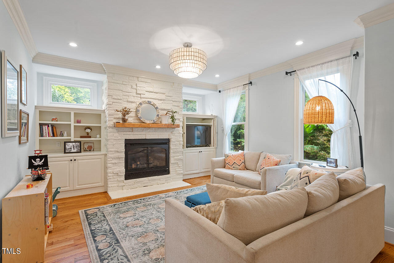 808 Elm Street Raleigh, NC 27604 - Photo 12 of 44 a living room with furniture and a fireplace