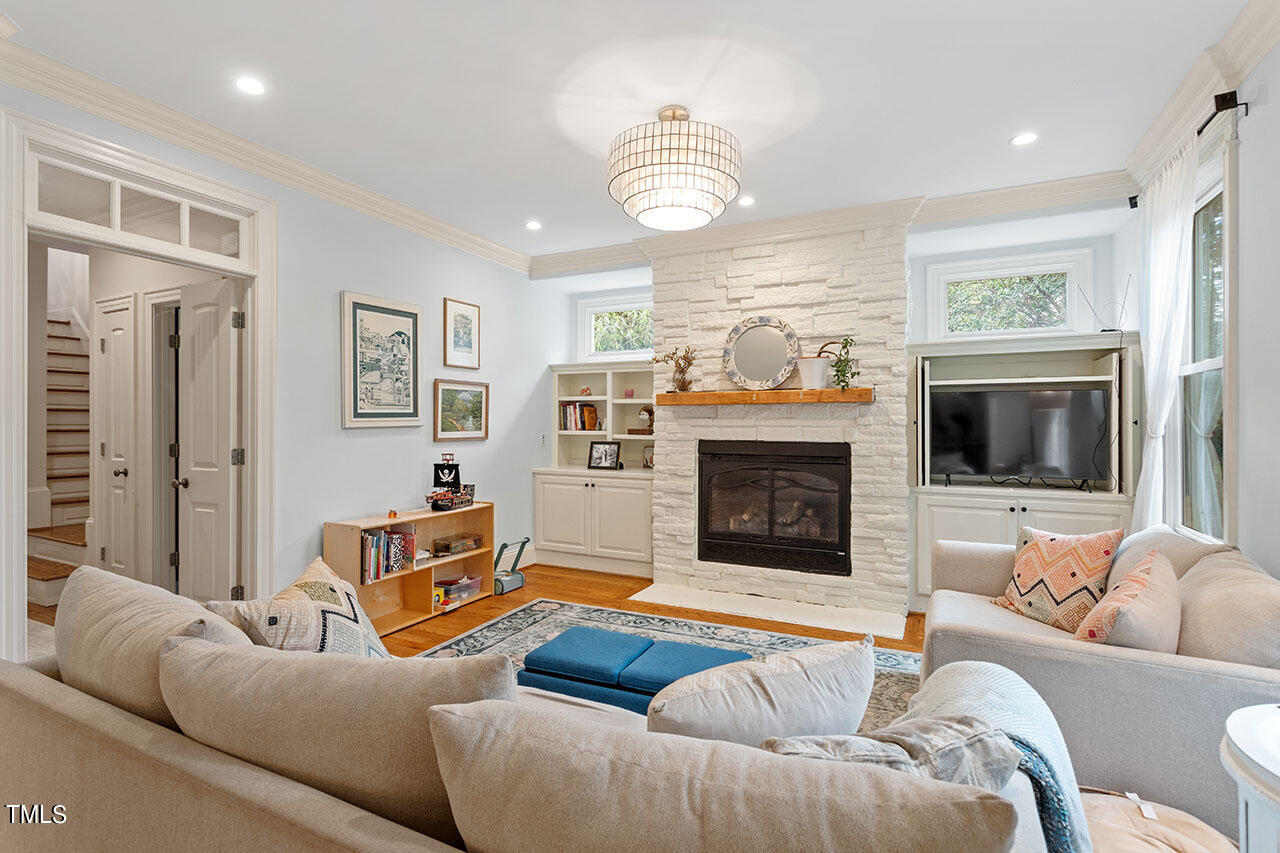 808 Elm Street Raleigh, NC 27604 - Photo 13 of 44 a living room with furniture and a fireplace